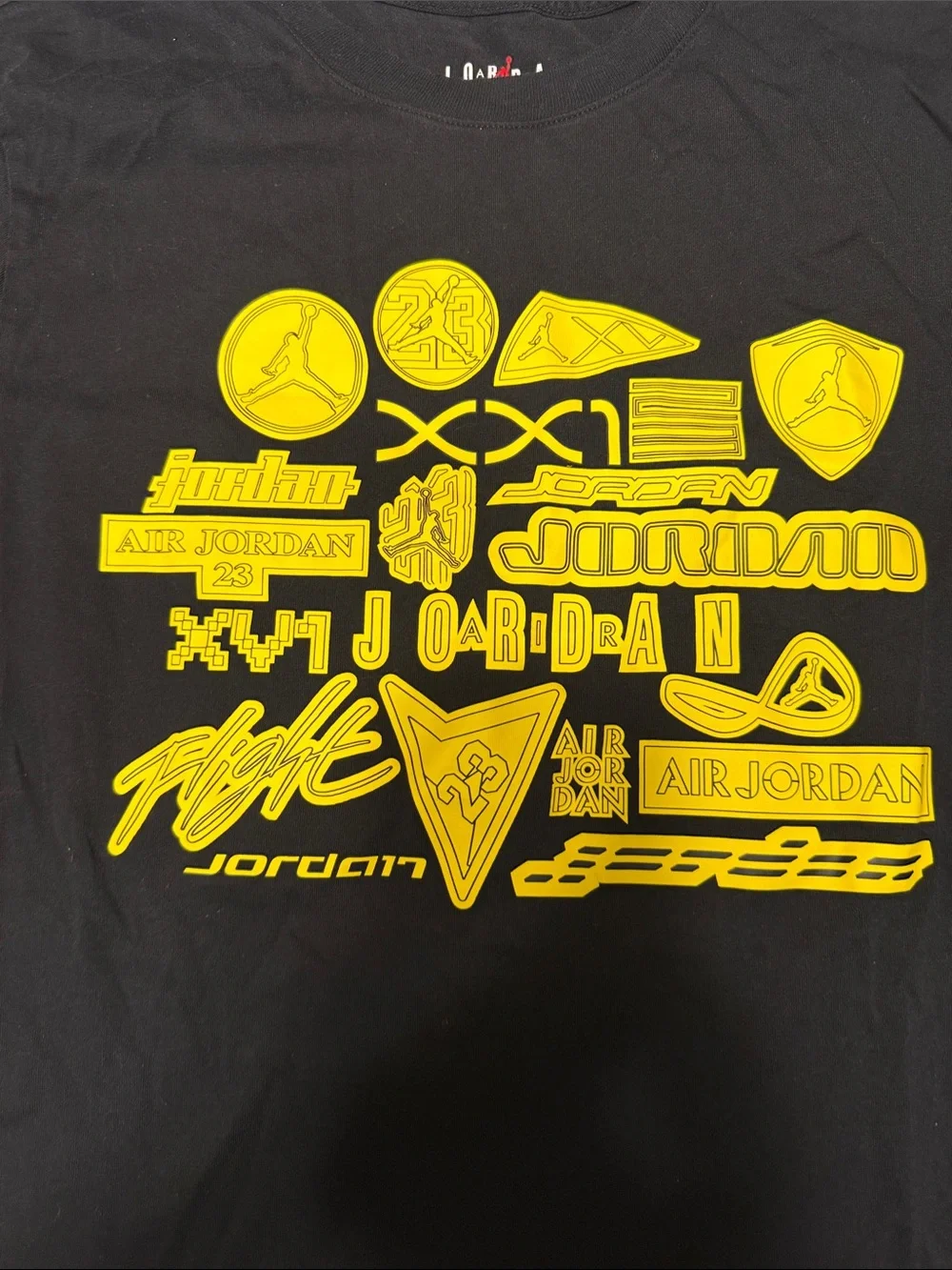 Jordan Short Sleeve Crew Tee in Black with Yellow Logo Graphics
